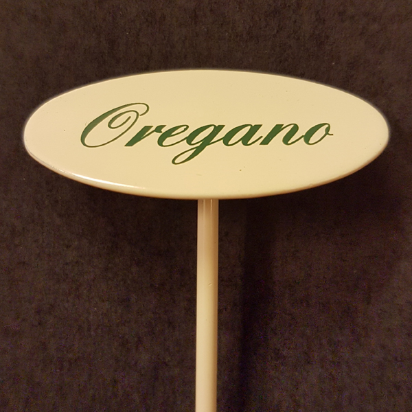 Oregano skylt liten på spjut