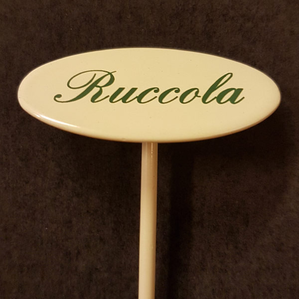 Ruccola skylt liten på spjut